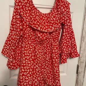 Red romper with white flowers
